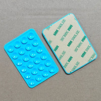 Suporte adesivo de silicone dupla face para celular