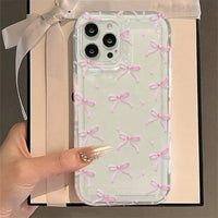 Capa transparente com laço e coração para iPhone