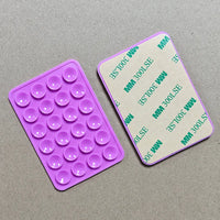 Suporte adesivo de silicone dupla face para celular